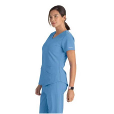 Skechers Breeze SK101 Scrub Top respirabil pentru femei (Ciel Blue) Skechers Breeze SK101 Scrub Top respirabil pentru femei (Ciel Blue)